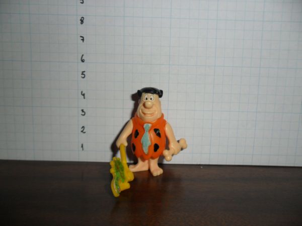 K95-71 - Flintstones - Fred com cortador